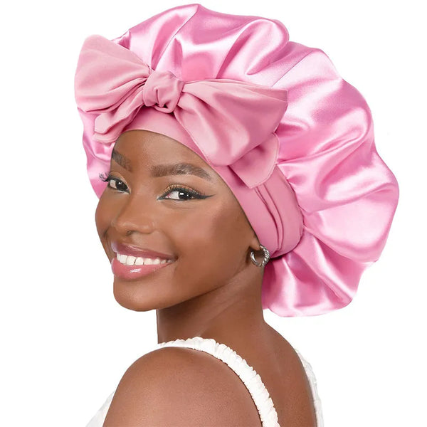 Bonnet de nuit en satin rose avec noeud - protection des cheveux